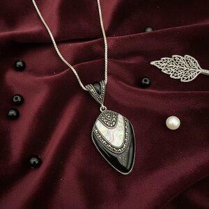 Silver Black Onyx , mother of pearl, and Marcasite accents Matinee Length​